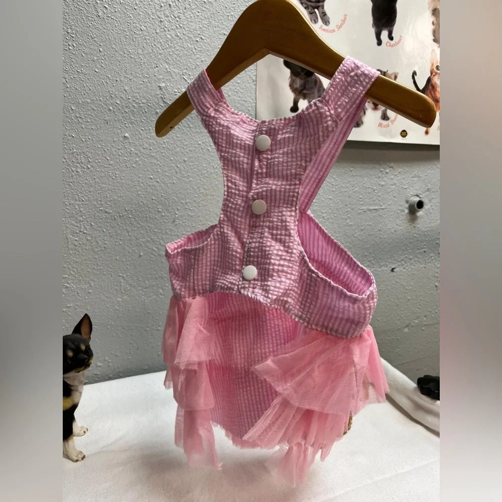 Pink and white striped ruffled dog dress with suspenders
